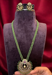 Stunning two layer beads mala with gold stones and green stones attached with beautiful pendant